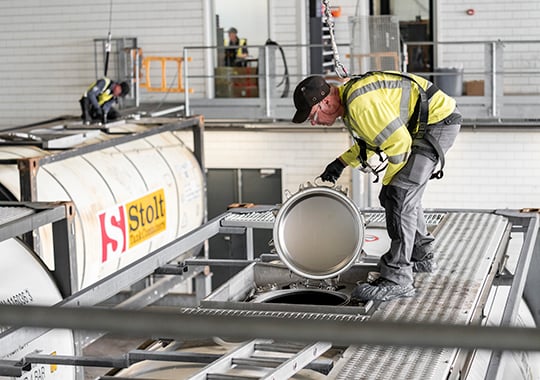 Expert inspecting Tank Container