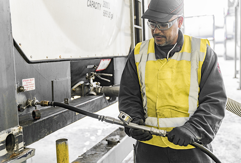 Stolt Tank Containers professional checking pressure of a tank container